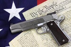 U.S. Constitution w. handgun and star on flag